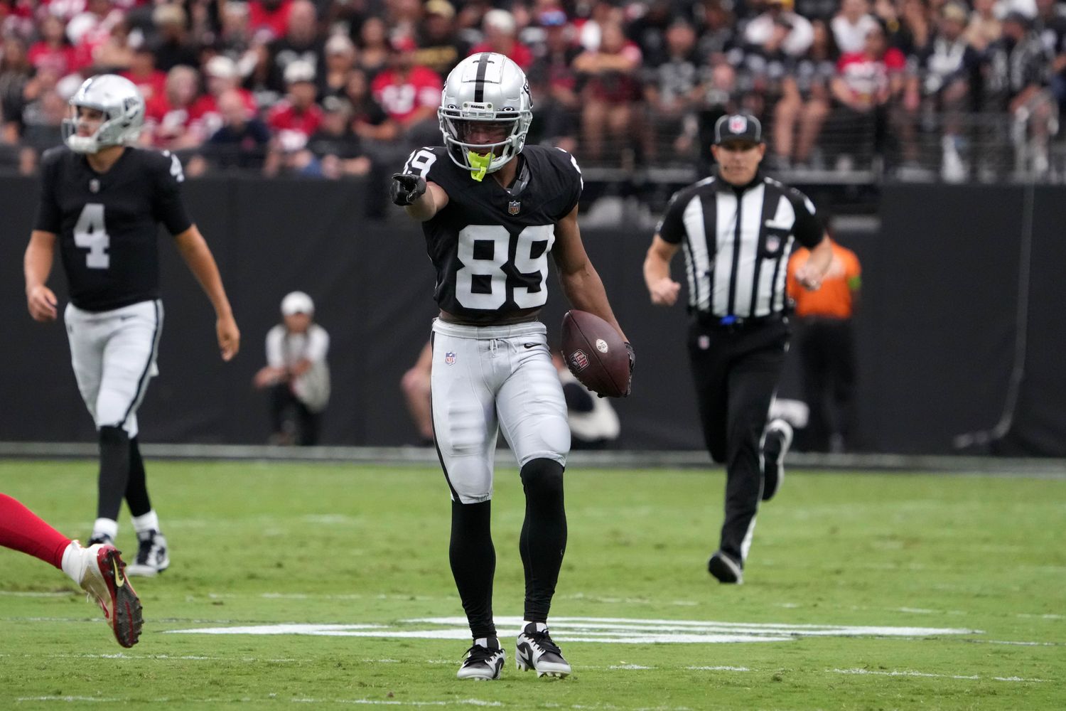Aug 13, 2023; Paradise, Nevada, USA; Las Vegas Raiders wide receiver Tre Tucker (89 gestures after a first down against the San Francisco 49ers in the first half at Allegiant Stadium. Mandatory Credit: Kirby Lee-USA TODAY Sports